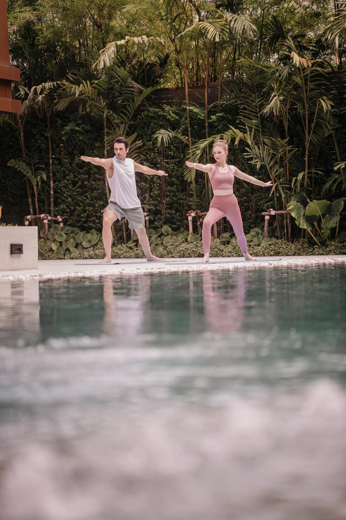 Nysa Hotel Bangkok Sukhumvit 11 Екстериор снимка A couple practicing yoga